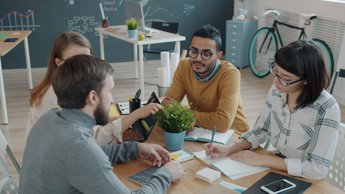 Team collaborating around a table in an office